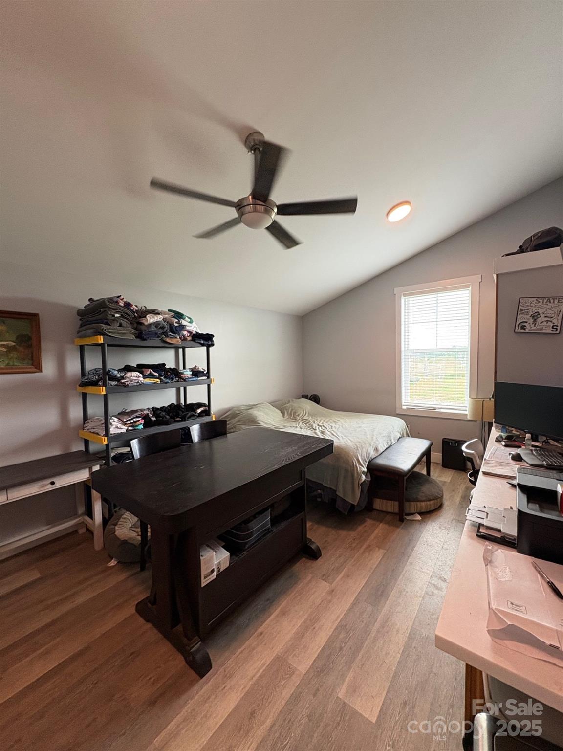 Vac Eddins-Poplin Road Norwood, NC 28128 - Photo 11 of 17 a living room with furniture a window and a flat screen tv