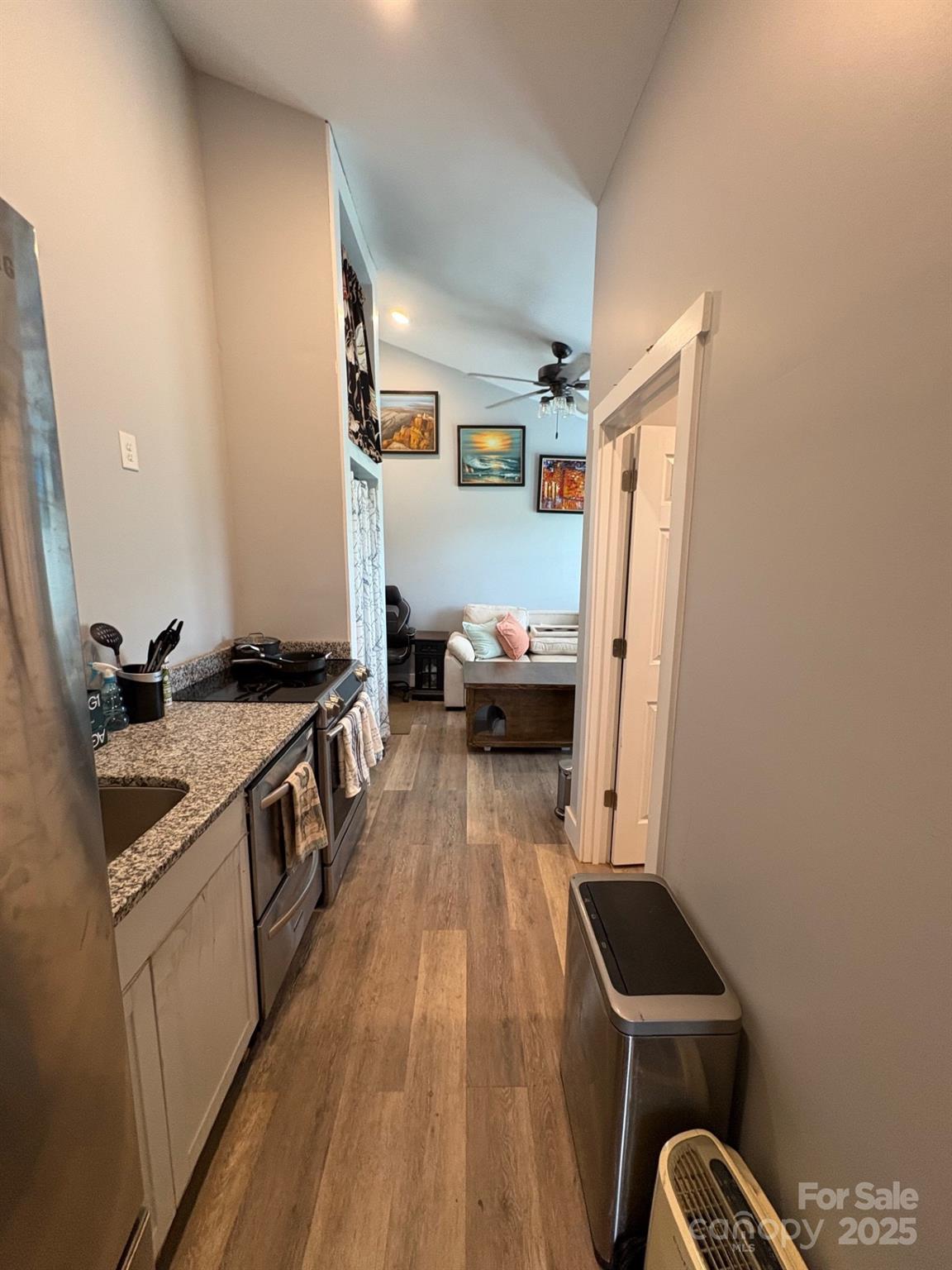 Vac Eddins-Poplin Road Norwood, NC 28128 - Photo 14 of 17 a kitchen with sink refrigerator and stove