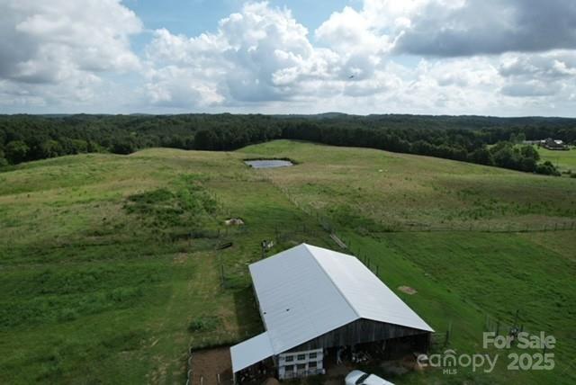 Vac Eddins-Poplin Road Norwood, NC 28128 - Photo 9 of 17 a view of a big yard with potted plants