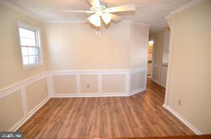 5377 Beta Place Indian Head, MD 20640 - Photo 2 of 13 wooden floor in an empty room with a window