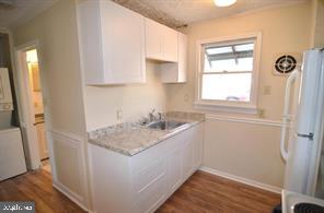 5377 Beta Place Indian Head, MD 20640 - Photo 4 of 13 a room with wooden floor and window