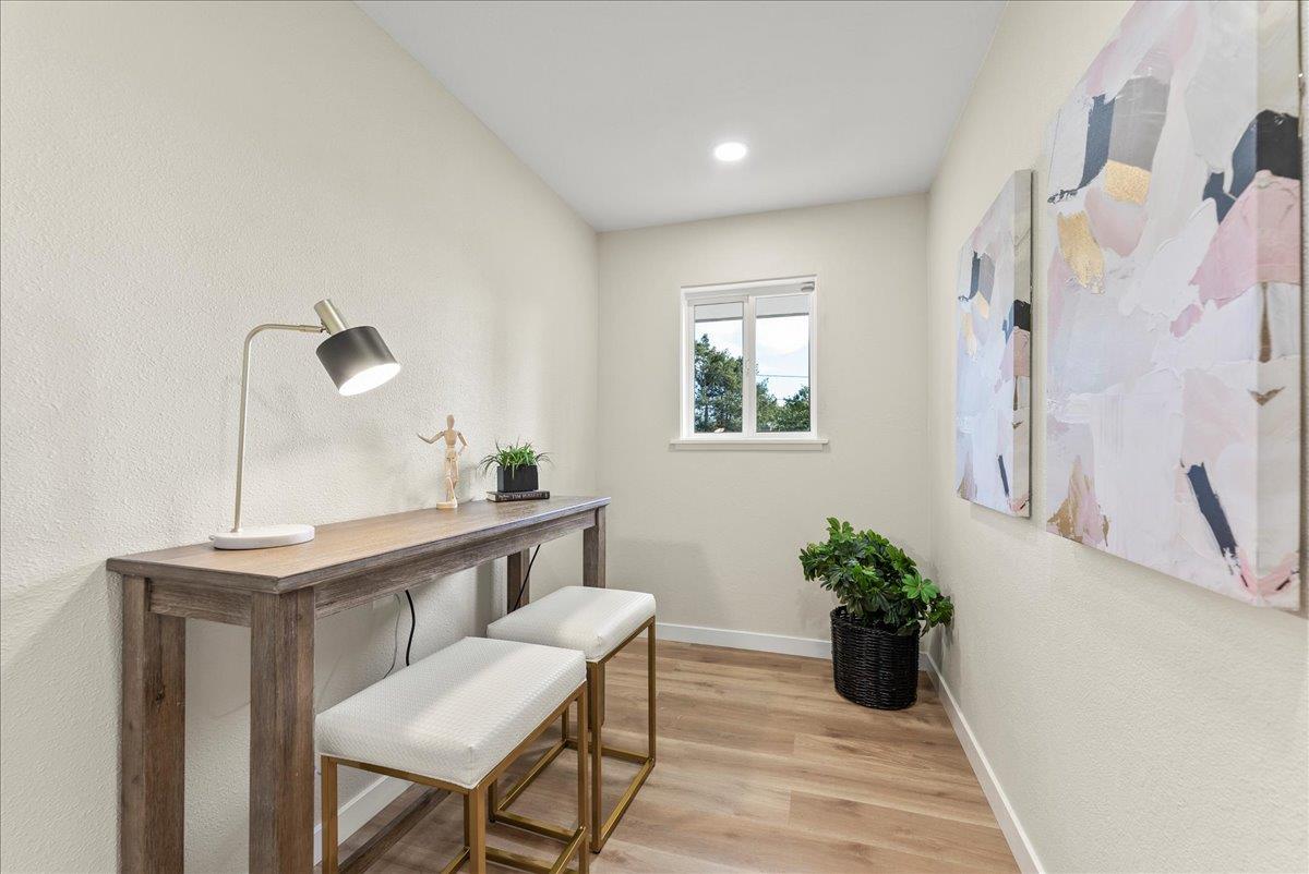 3400 Haas Drive Aptos, CA 95003 - Photo 13 of 32 a view of a workspace with furniture and a potted plant