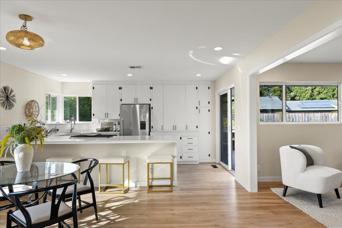 3400 Haas Drive Aptos, CA 95003 - Photo 4 of 32 a large kitchen with a table and chairs