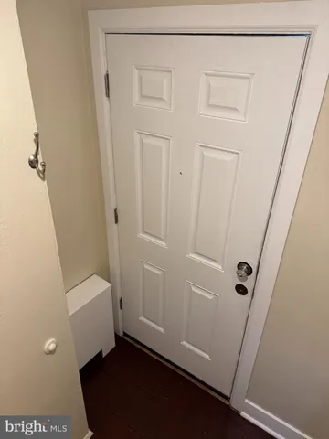 a view of a living room and hardwood floor