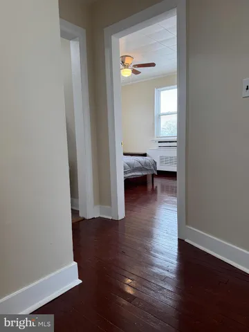 a view of livingroom with furniture and wooden floor