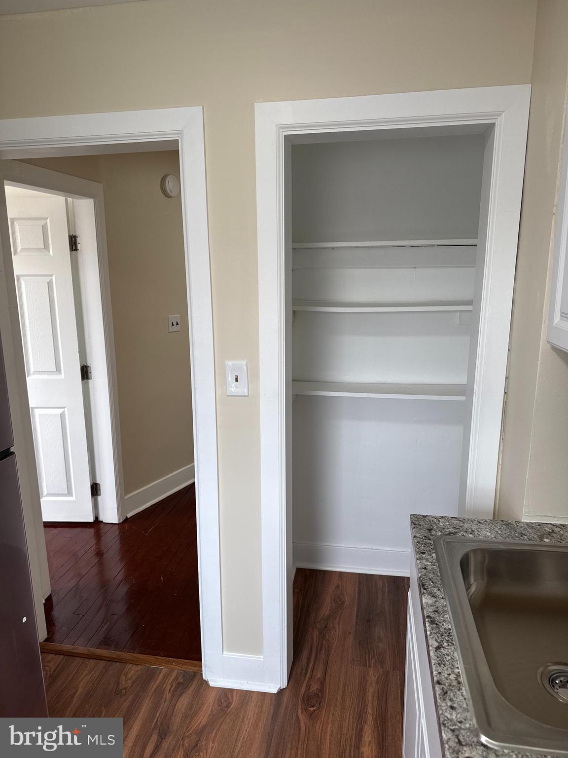 8529 Chestnut Oak Road, Unit 2 Parkville, MD 21234 - Photo 26 of 50 a view of walk in closet with wooden floor