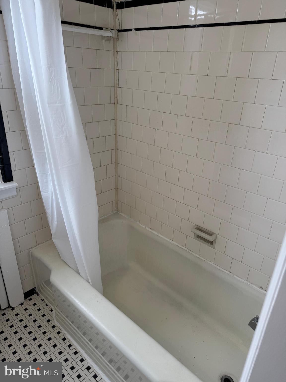 8529 Chestnut Oak Road, Unit 2 Parkville, MD 21234 - Photo 39 of 50 a bathroom with a bathtub