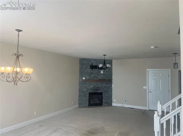 a kitchen with stainless steel appliances granite countertop a sink and a stove