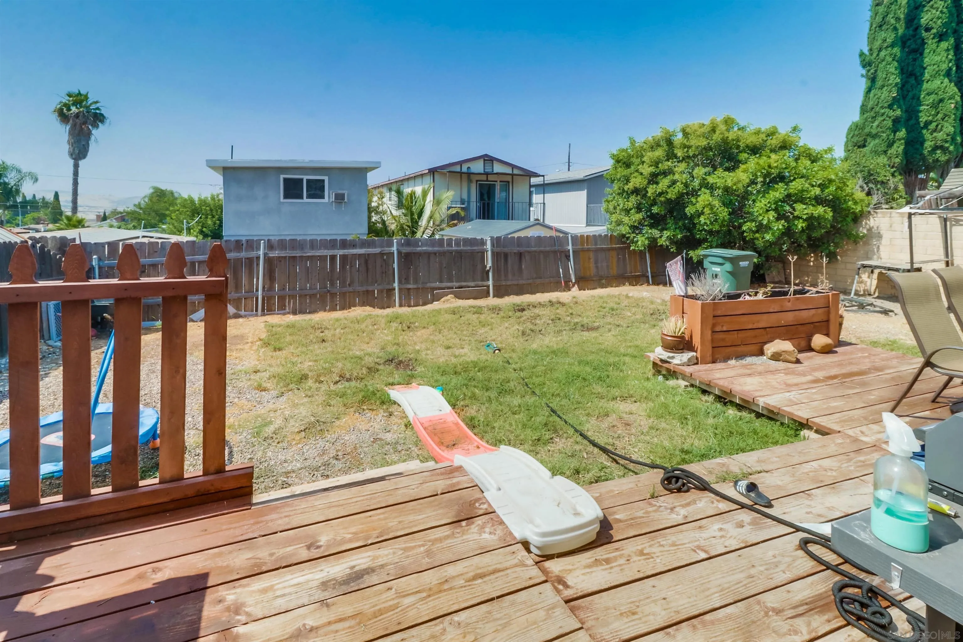 9833 St George Street Spring Valley, CA 91977 - Photo 19 of 19 a view of a backyard with sitting area