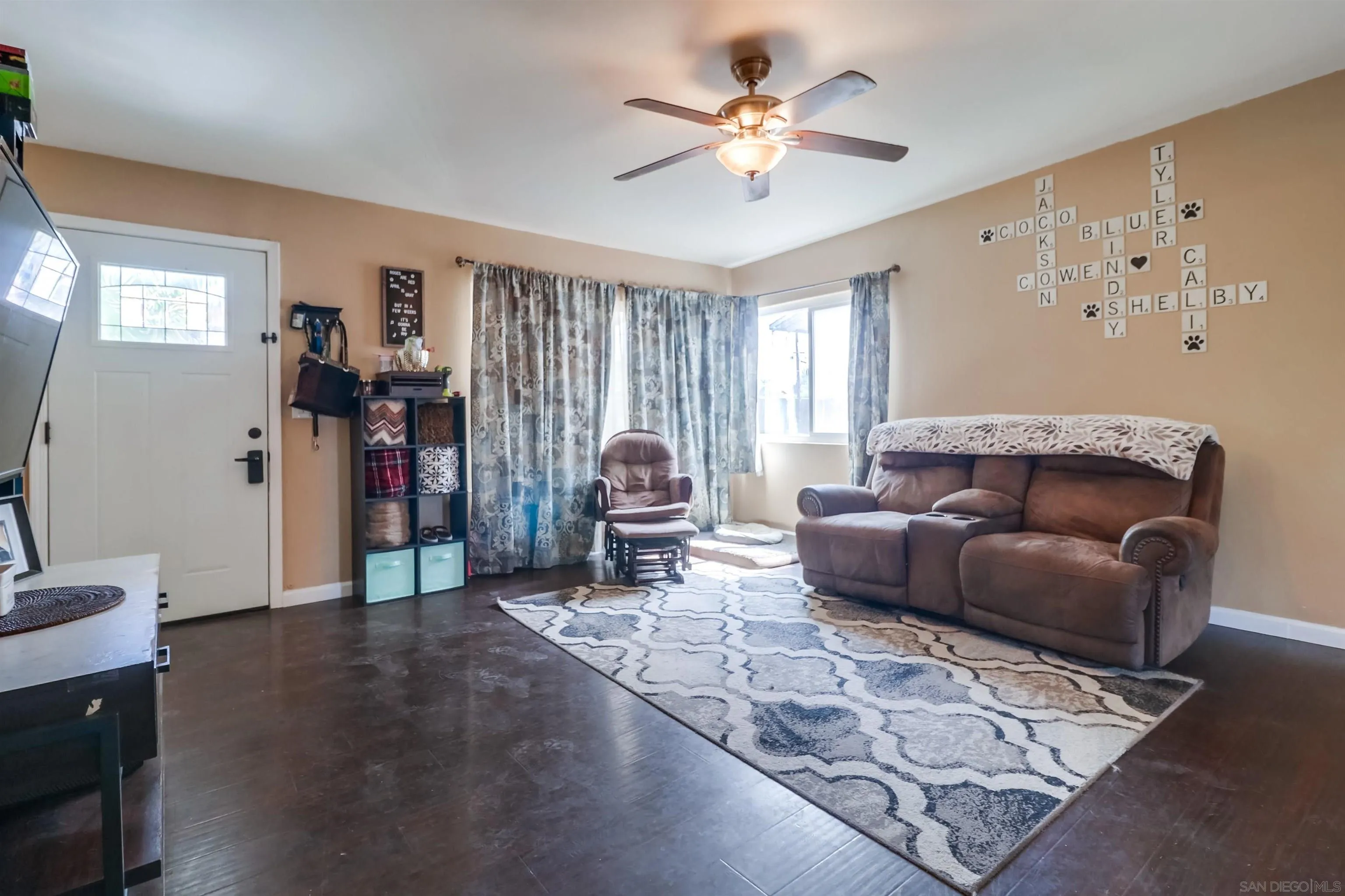 9833 St George Street Spring Valley, CA 91977 - Photo 5 of 19 a living room with furniture and wooden floor