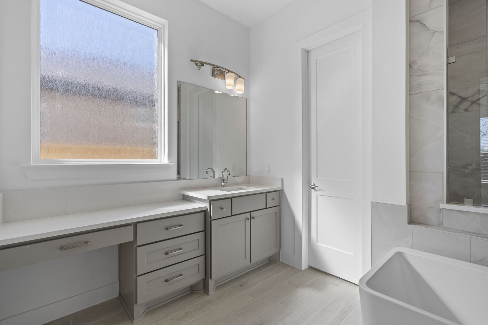 9103 Basilica Lane Manvel, TX 77578 - Photo 14 of 50 a bathroom with a sink double vanity and a mirror