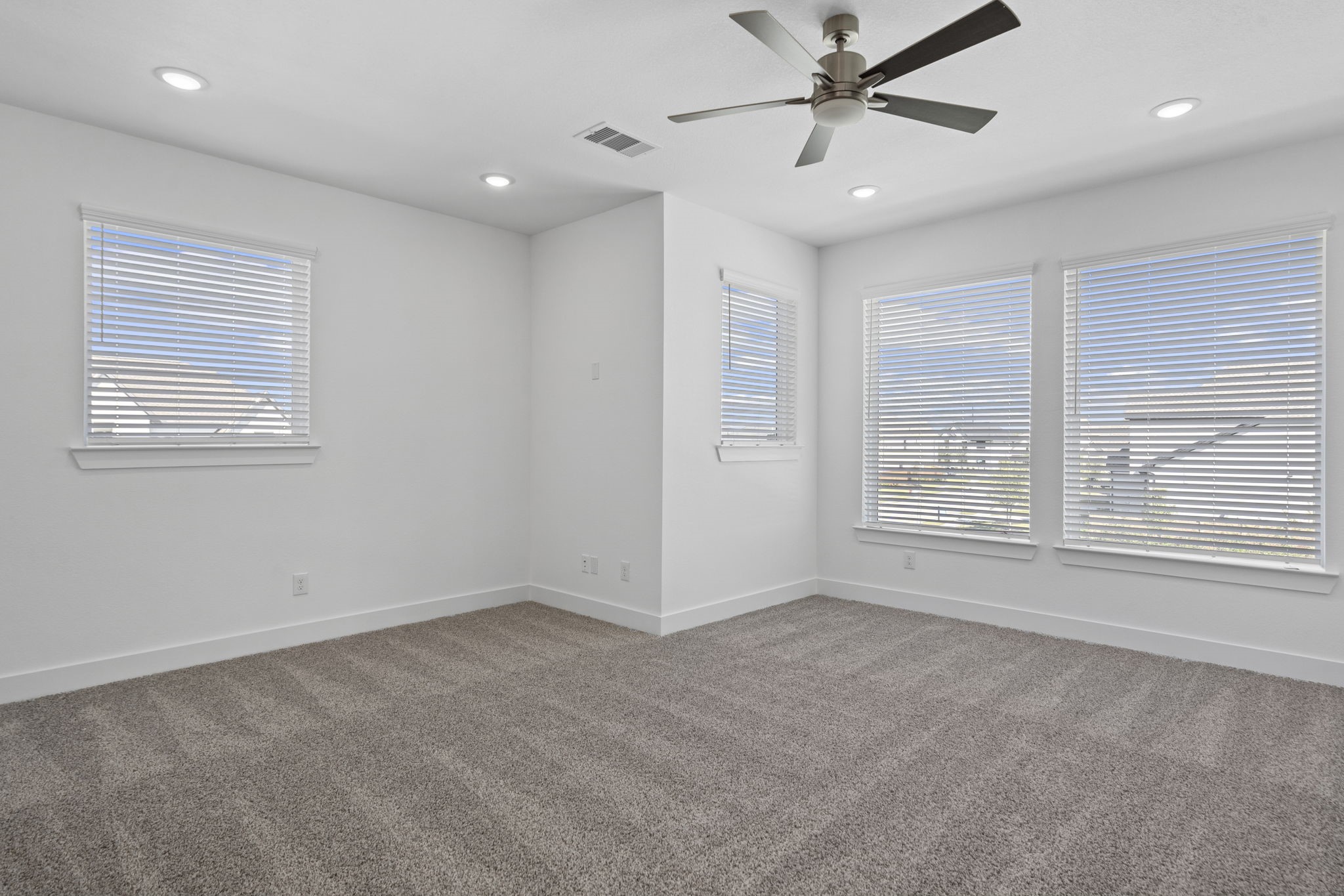 9103 Basilica Lane Manvel, TX 77578 - Photo 20 of 50 a view of an empty room with a window