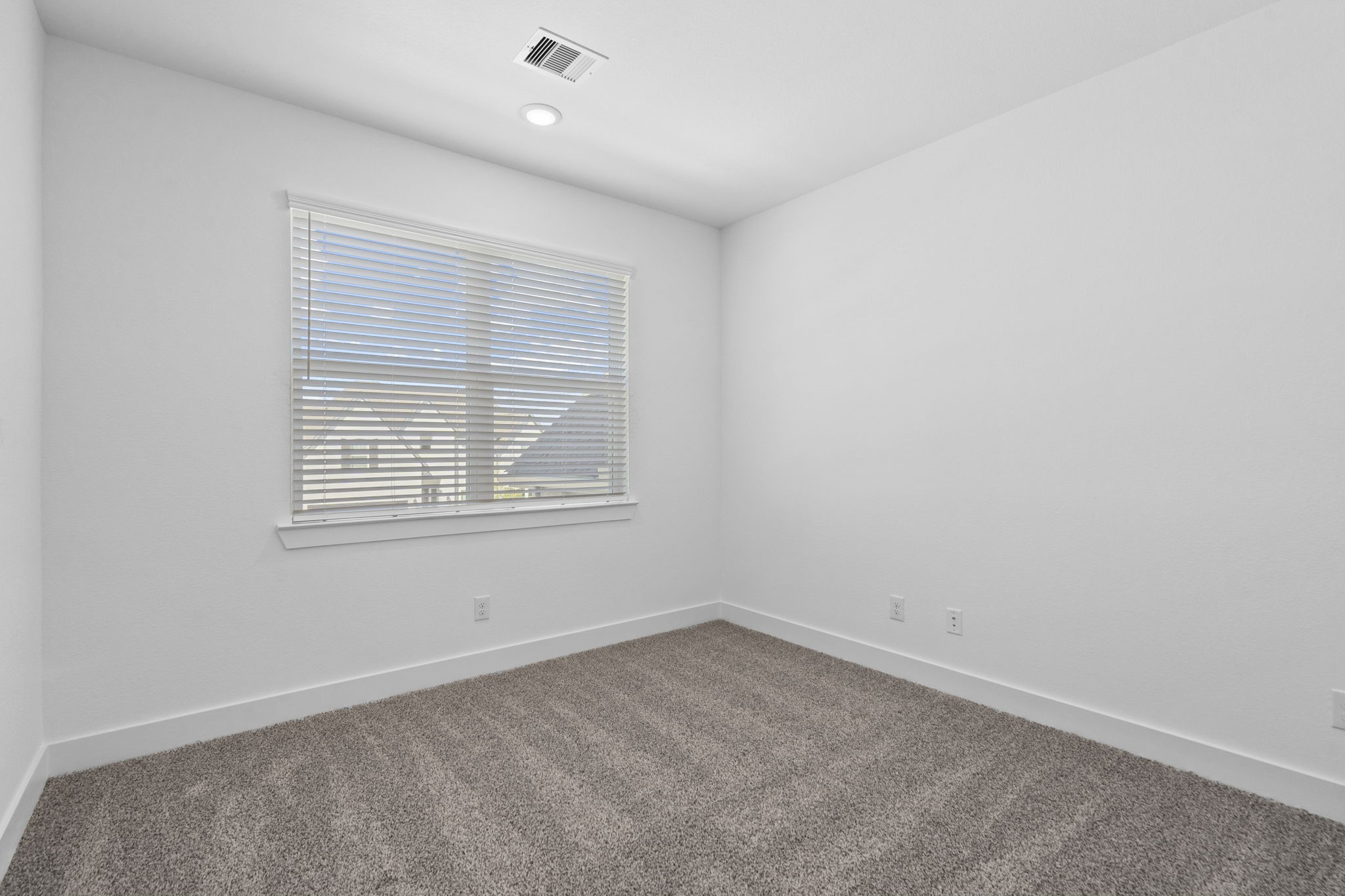 9103 Basilica Lane Manvel, TX 77578 - Photo 24 of 50 an empty room with a window