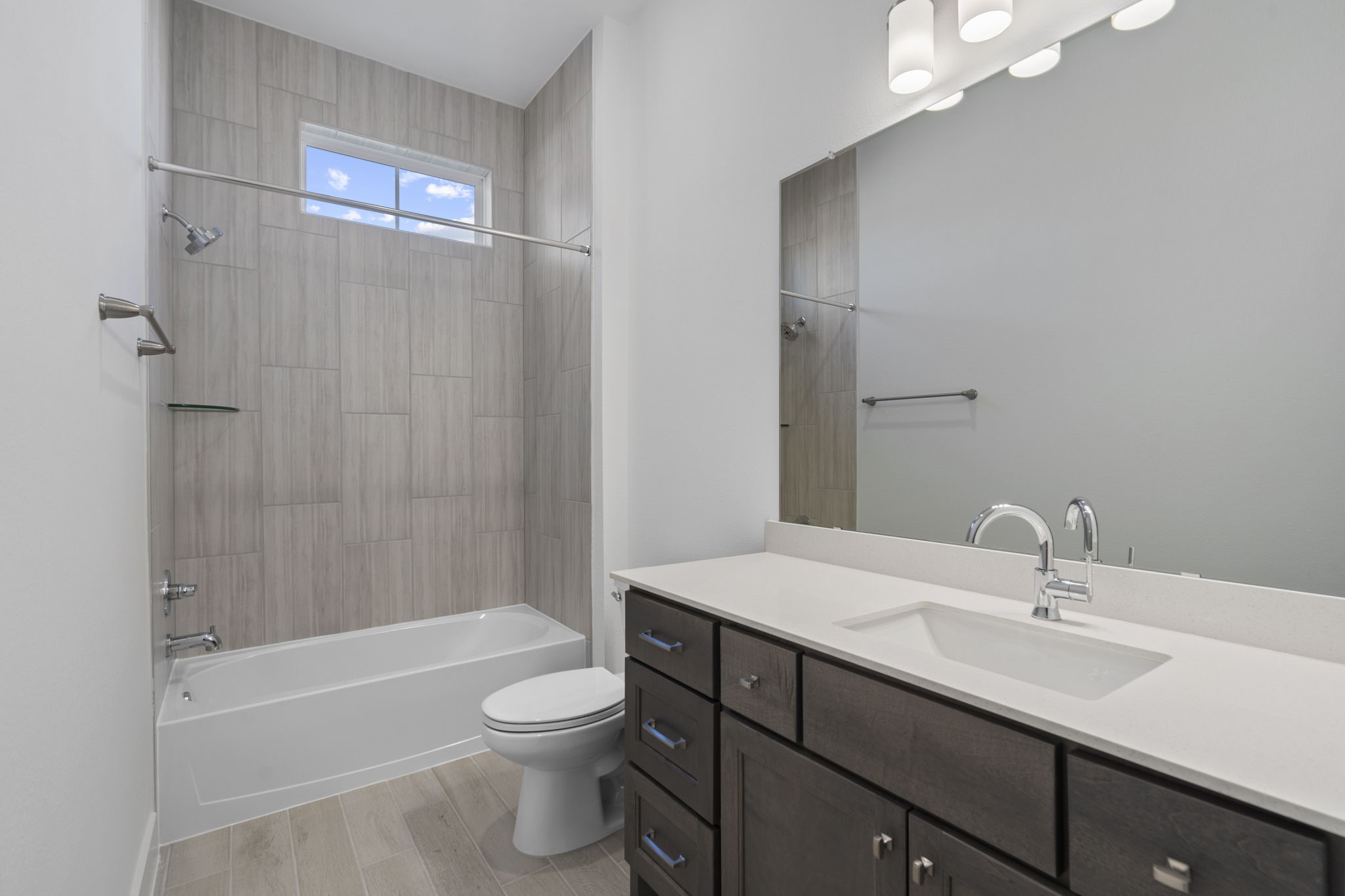 9103 Basilica Lane Manvel, TX 77578 - Photo 27 of 50 a bathroom with a sink a toilet and shower