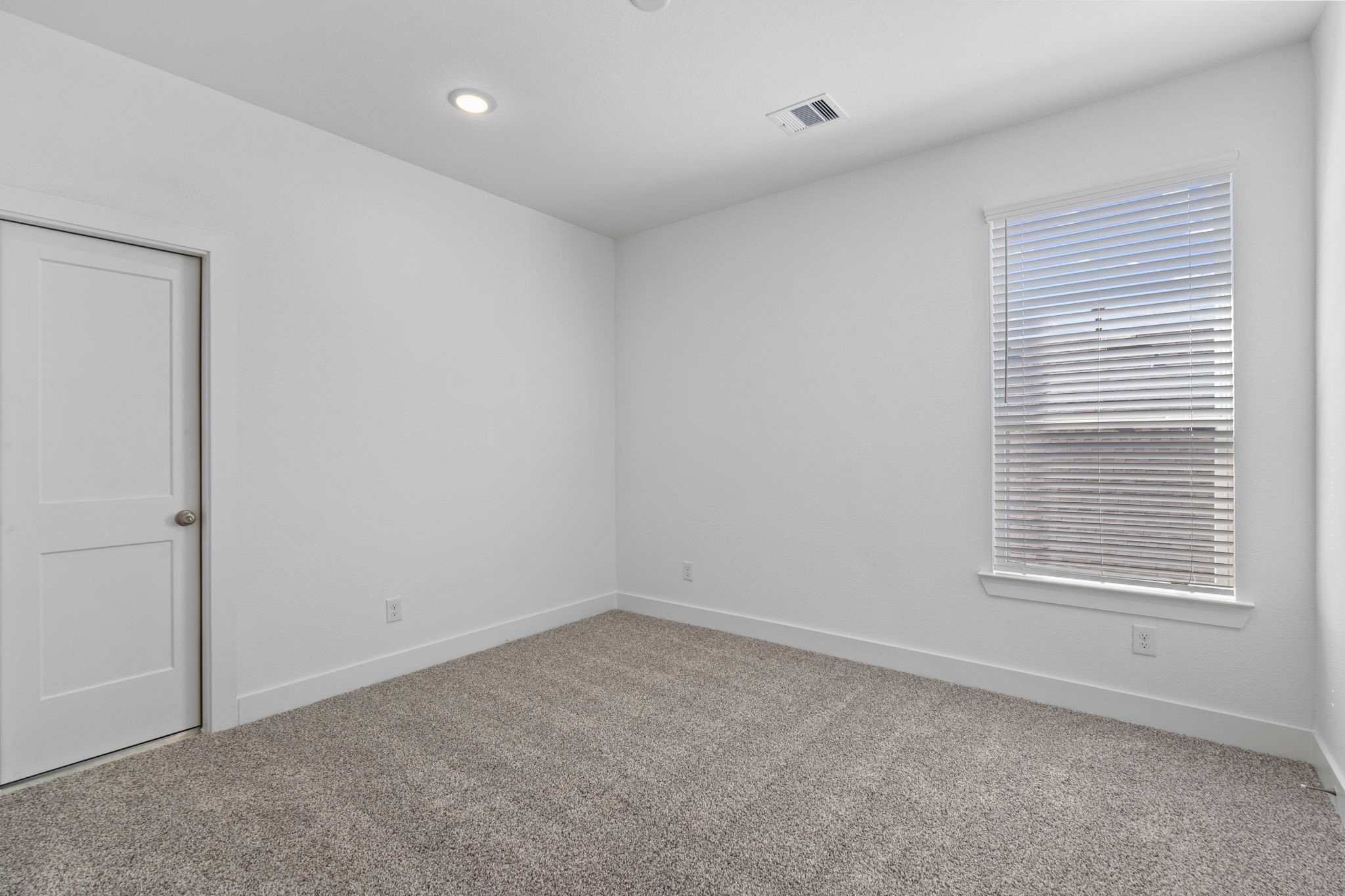9103 Basilica Lane Manvel, TX 77578 - Photo 28 of 50 an empty room with a window