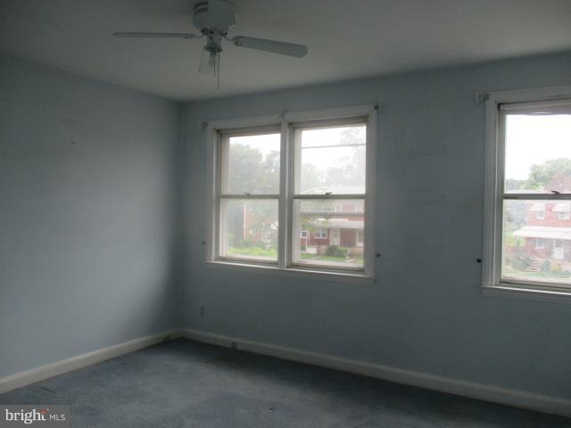 122 Hampshire Road Baltimore, MD 21221 - Photo 15 of 22 an empty room with a window