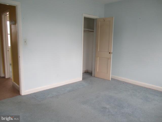 122 Hampshire Road Baltimore, MD 21221 - Photo 16 of 22 a view of an empty room and closet area