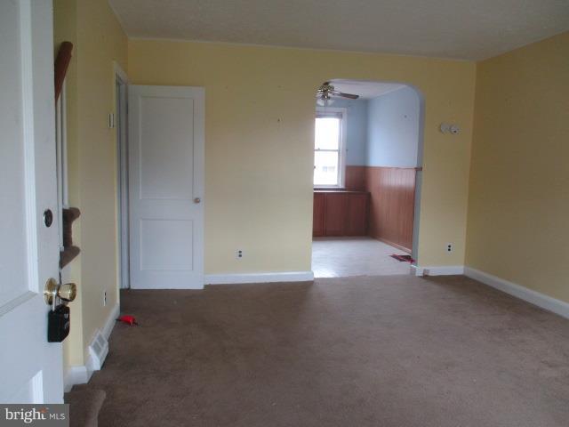 122 Hampshire Road Baltimore, MD 21221 - Photo 3 of 22 a view of a room with a fireplace