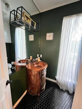 a room with a table and chairs