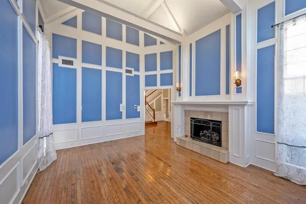 a view of fireplace and wooden floor