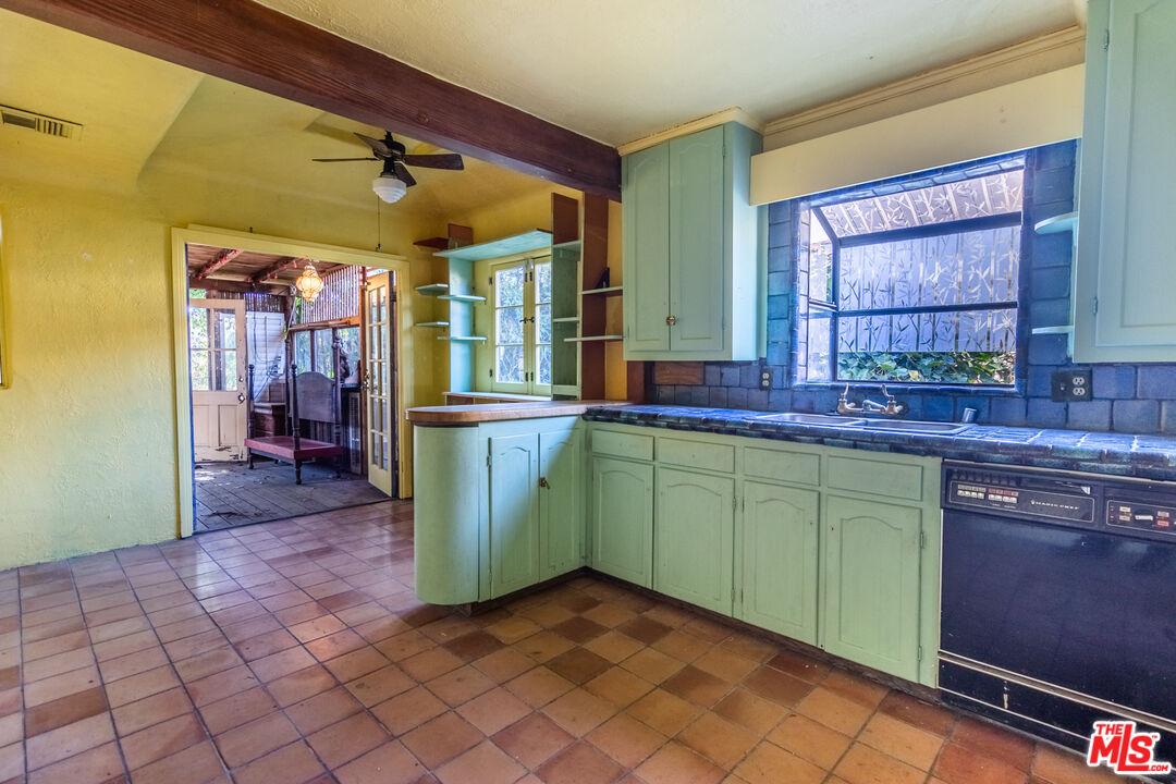 2371 Midvale Avenue Los Angeles, CA 90064 - Photo 12 of 33 a kitchen with a sink and a large window