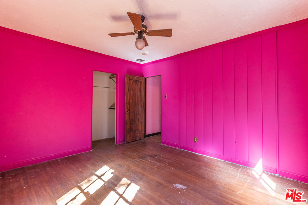 2371 Midvale Avenue Los Angeles, CA 90064 - Photo 20 of 33 a view of a livingroom with a sofa and a ceiling fan