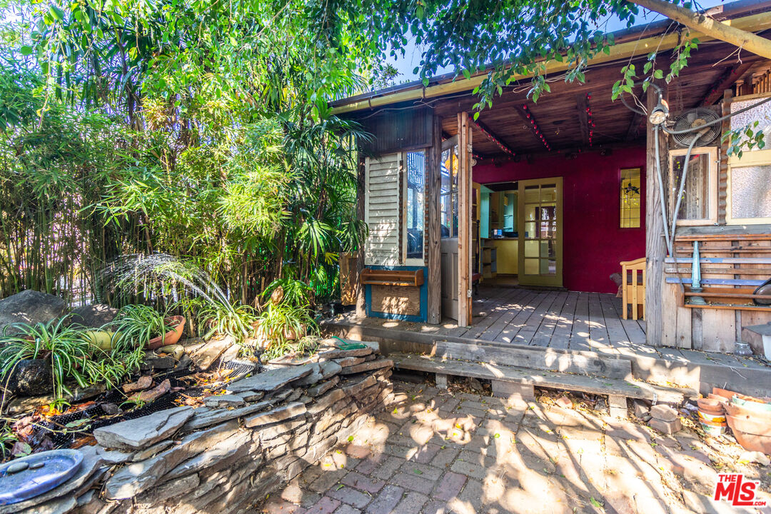 2371 Midvale Avenue Los Angeles, CA 90064 - Photo 29 of 33 a view of a house with a yard