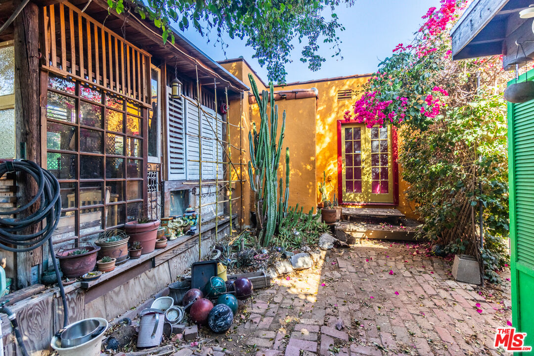 2371 Midvale Avenue Los Angeles, CA 90064 - Photo 31 of 33 a front view of a house with a yard