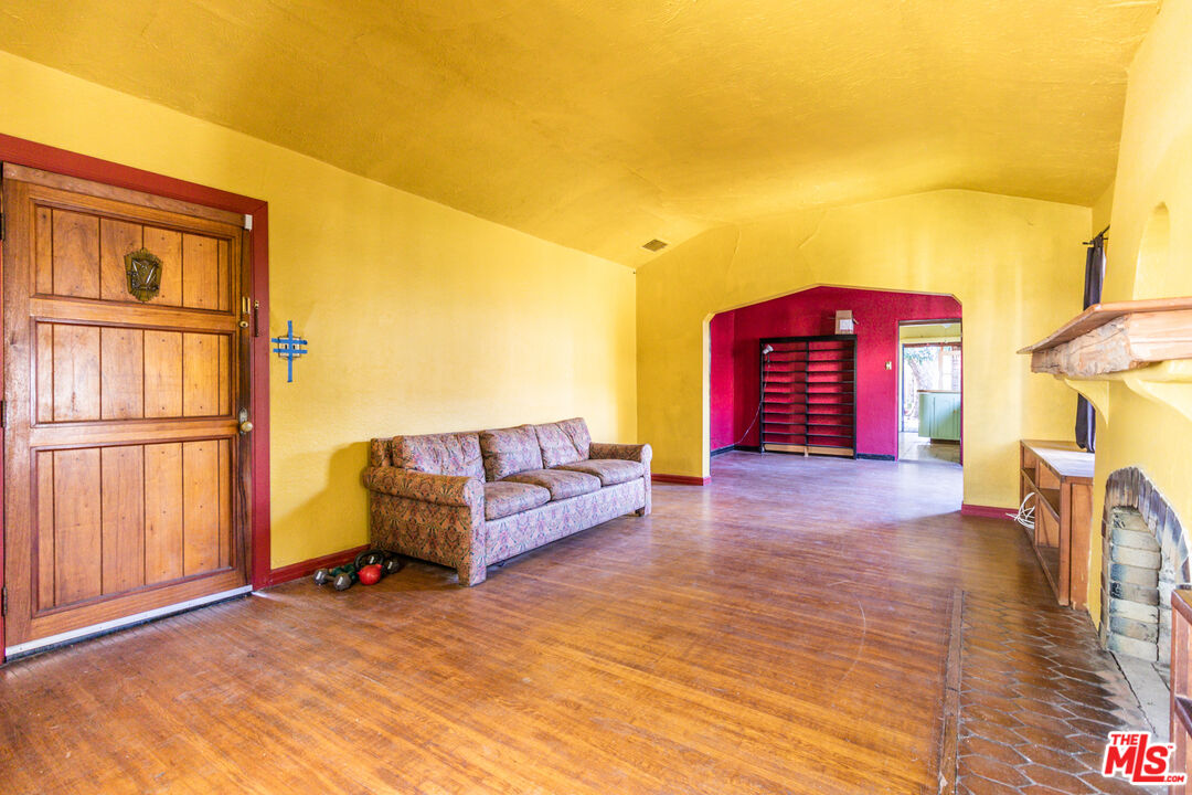2371 Midvale Avenue Los Angeles, CA 90064 - Photo 8 of 33 a view of a living room with a couch and wooden floor