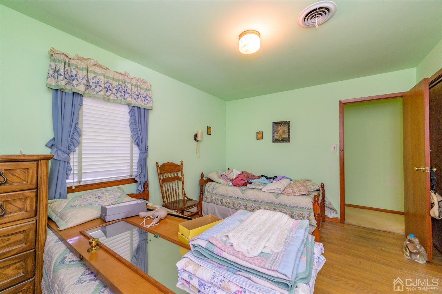370 East Millstream Road Cream Ridge, NJ 08514 - Photo 23 of 54 a view of a workspace with furniture and wooden floor