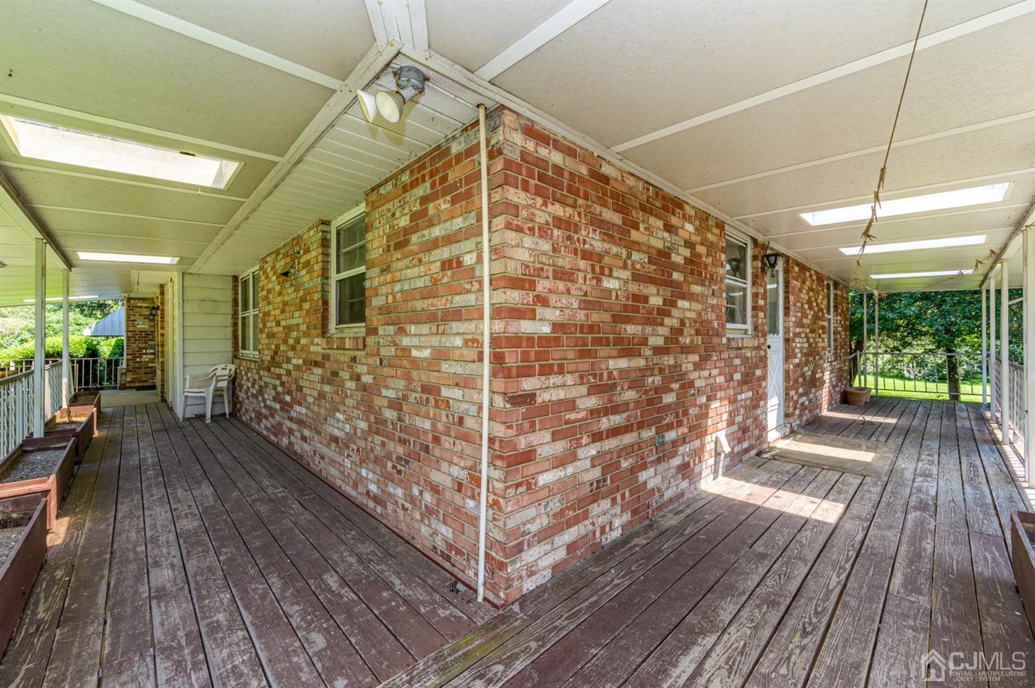 370 East Millstream Road Cream Ridge, NJ 08514 - Photo 4 of 54 a view of outdoor space with wooden floor