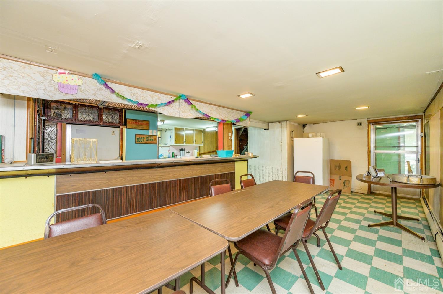 370 East Millstream Road Cream Ridge, NJ 08514 - Photo 45 of 54 a kitchen with a table and chairs in it