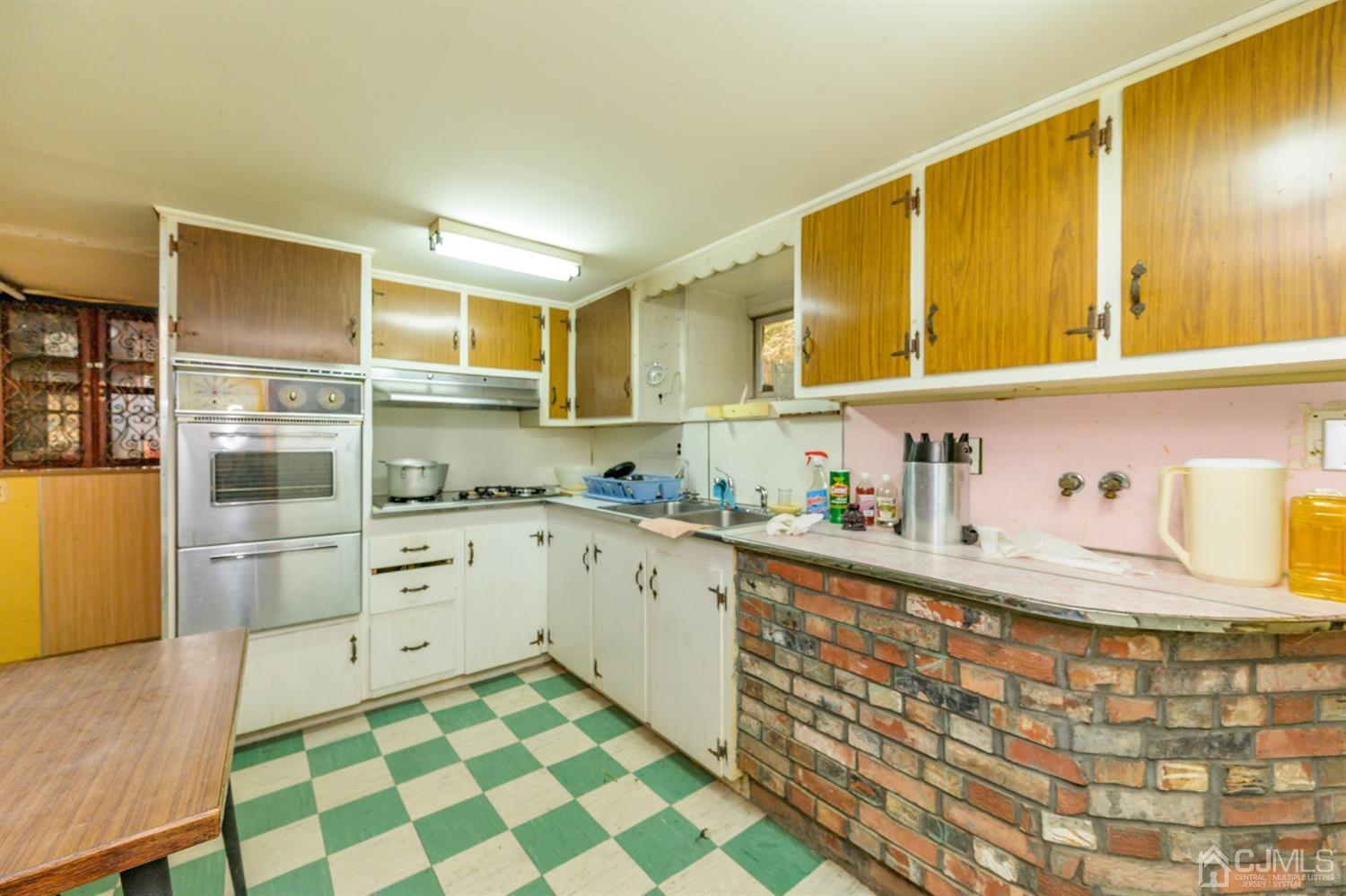 370 East Millstream Road Cream Ridge, NJ 08514 - Photo 48 of 54 a kitchen with a cabinets and appliances