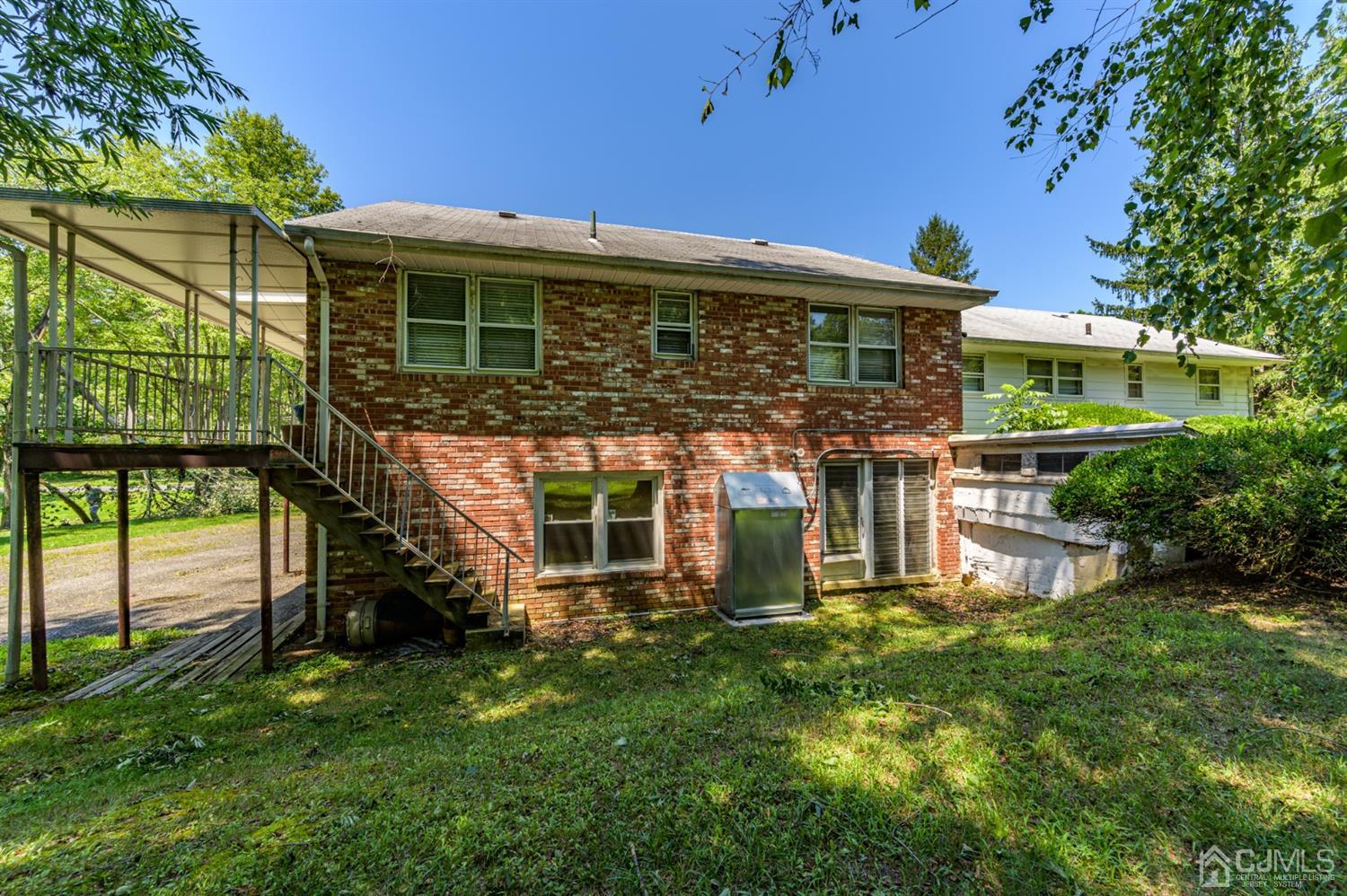 370 East Millstream Road Cream Ridge, NJ 08514 - Photo 50 of 54 front view of a house with a yard