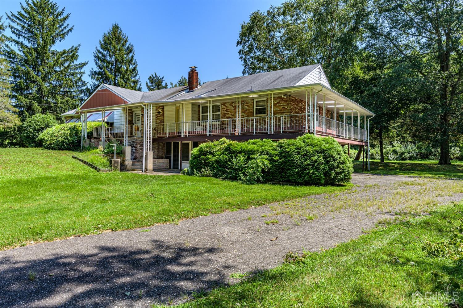 370 East Millstream Road Cream Ridge, NJ 08514 - Photo 54 of 54 a front view of house with yard and green space