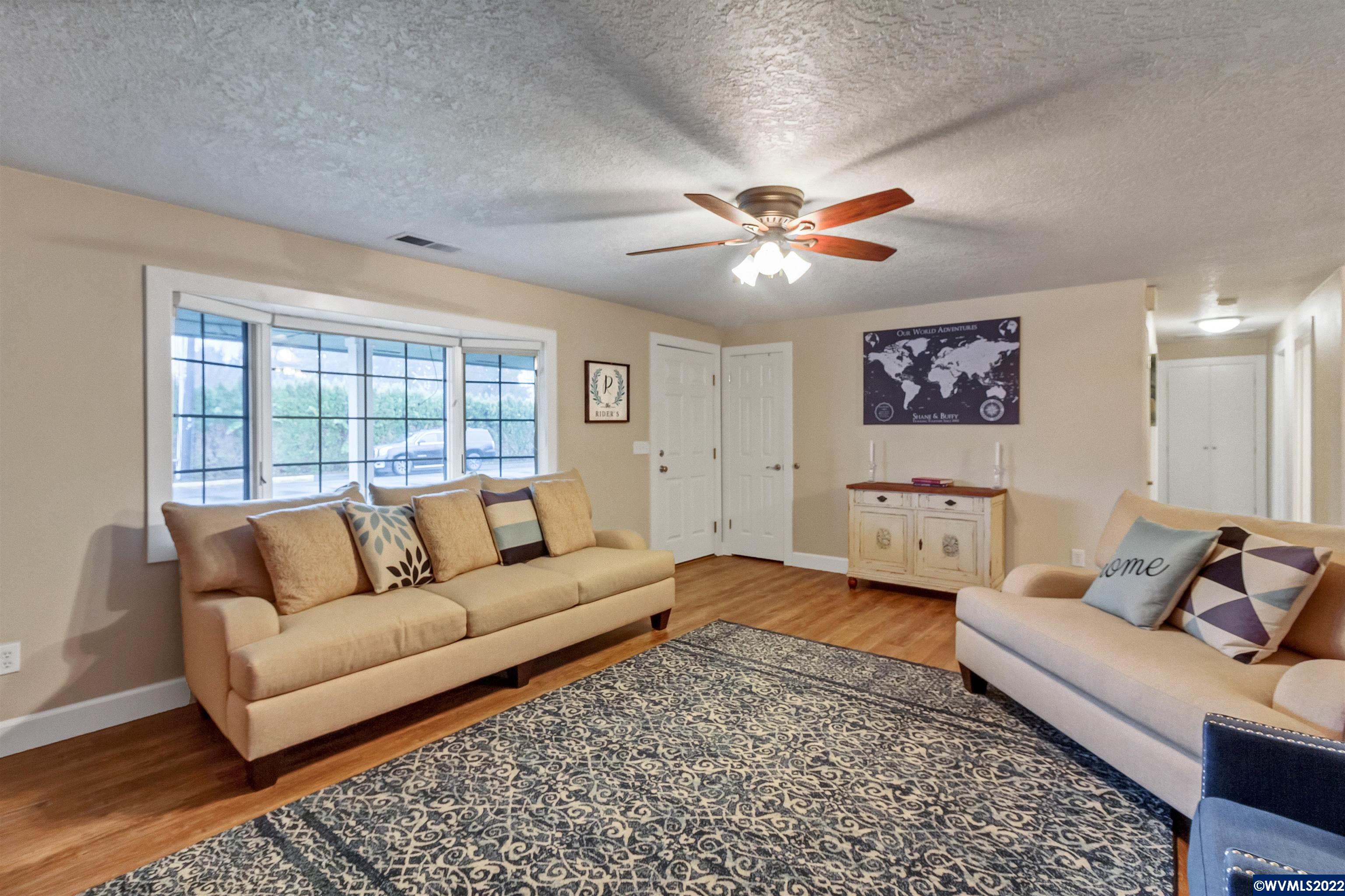 150 Edwards Road South Monmouth, OR 97361 - Photo 4 of 39 a living room with furniture and a large window