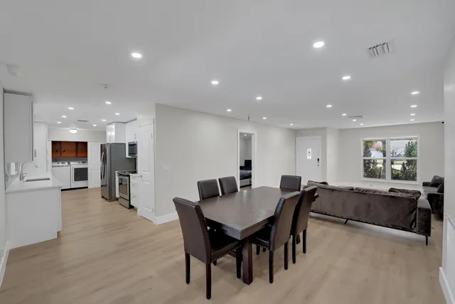 a view of a dining room with furniture
