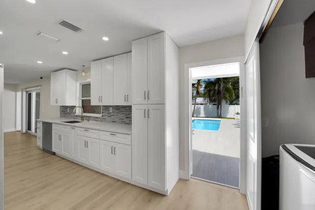 a view of a house with a swimming pool