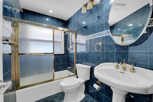 a living room with furniture and flat screen tv