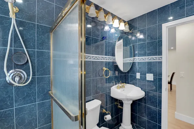 a living room with a couch and a flat screen tv