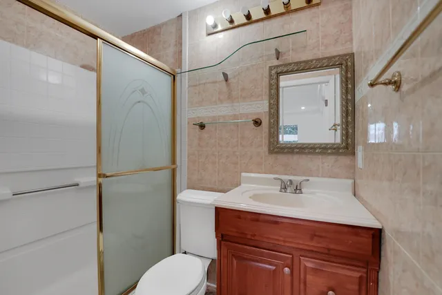 a view of a house with swimming pool and sitting area