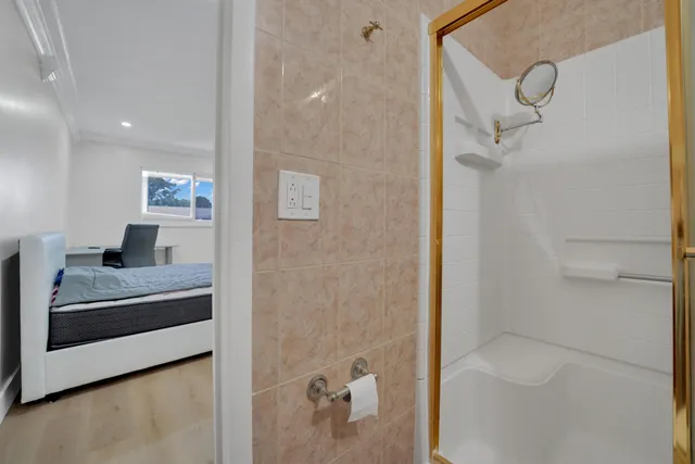 a view of a house with swimming pool and sitting area