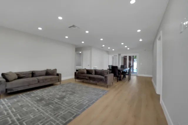 a living room with furniture and a couch