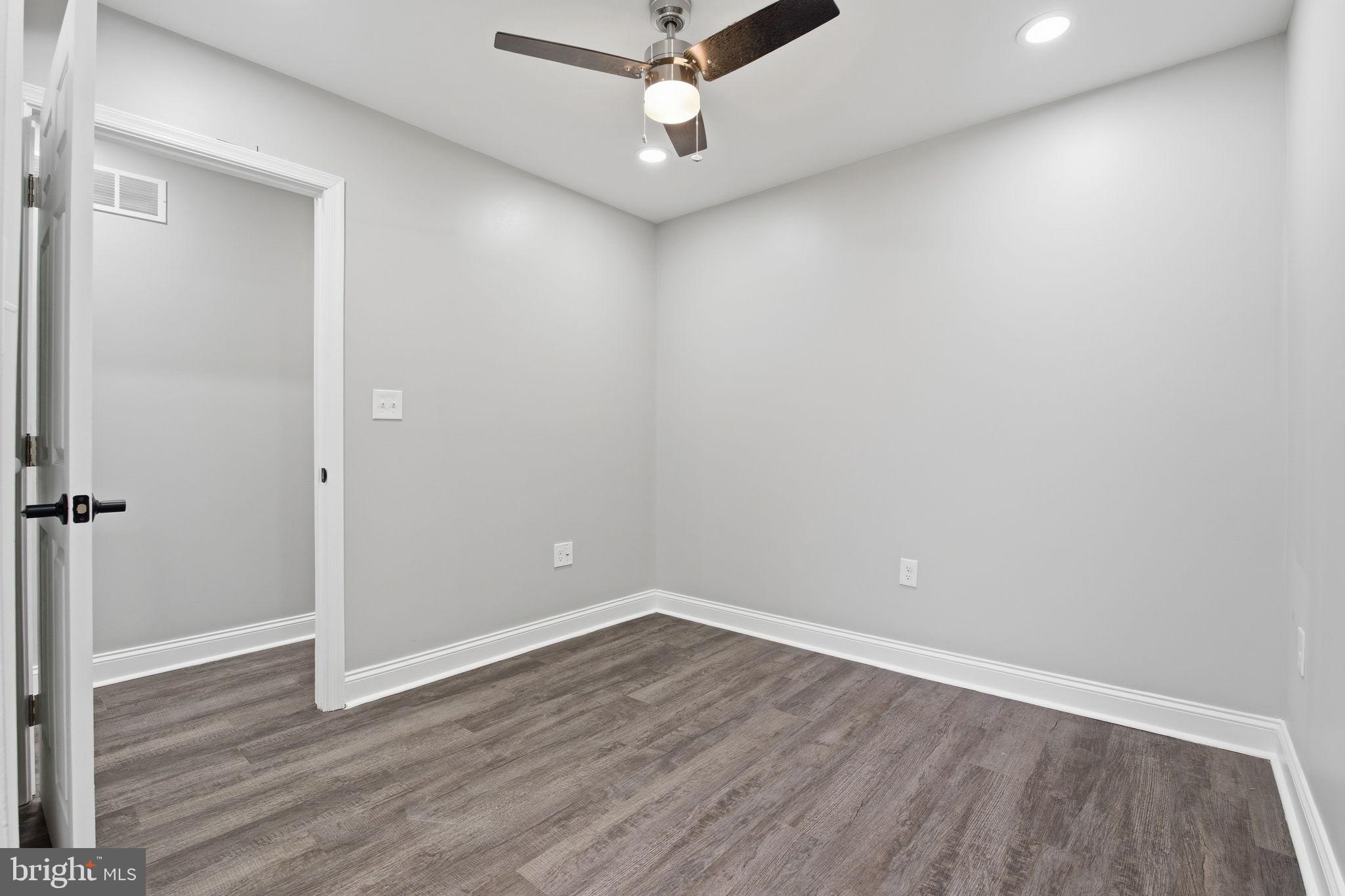 1708 Federal Street Baltimore, MD 21213 - Photo 21 of 33 wooden floor in an empty room