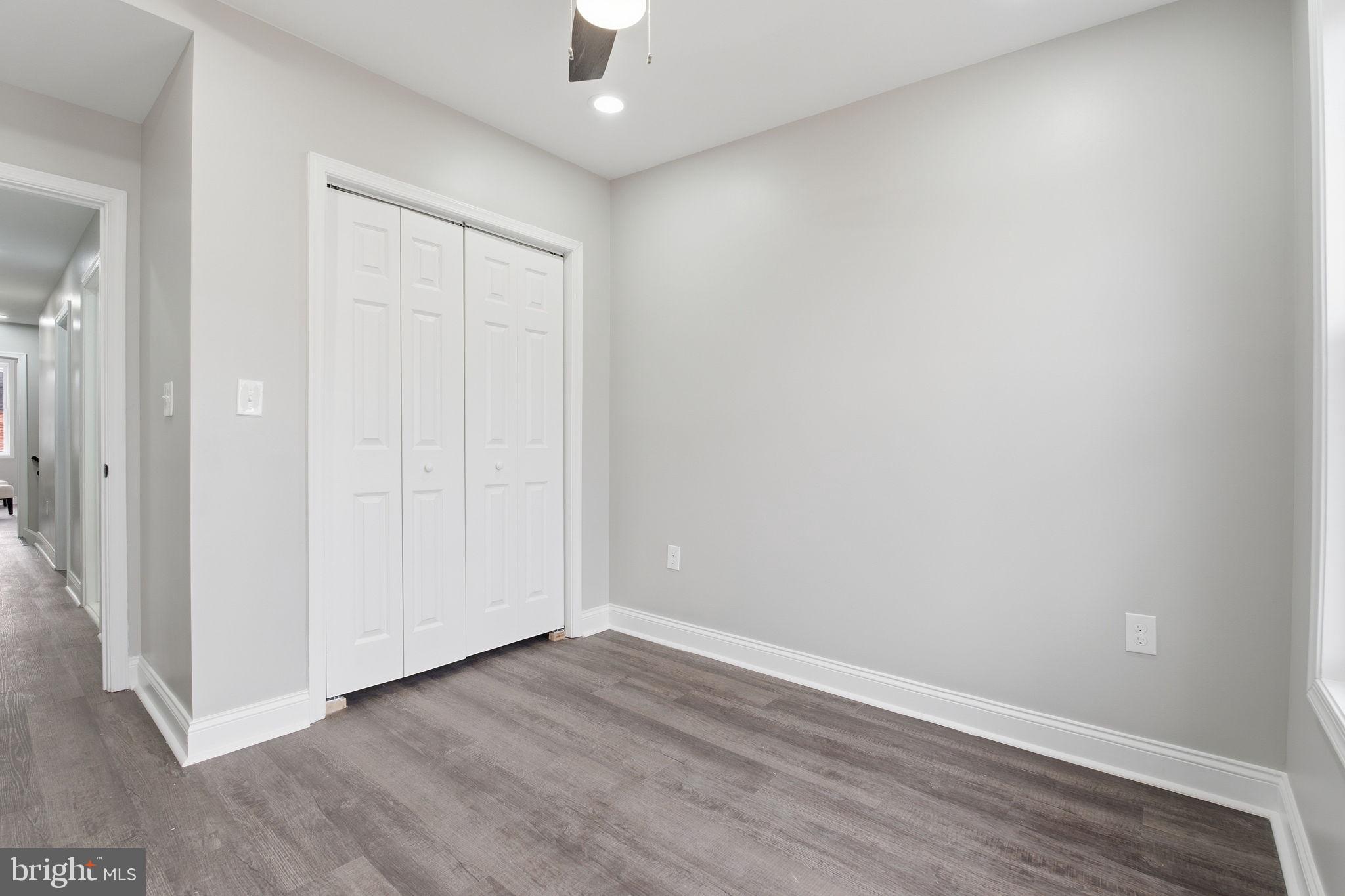 1708 Federal Street Baltimore, MD 21213 - Photo 24 of 33 wooden floor in an empty room