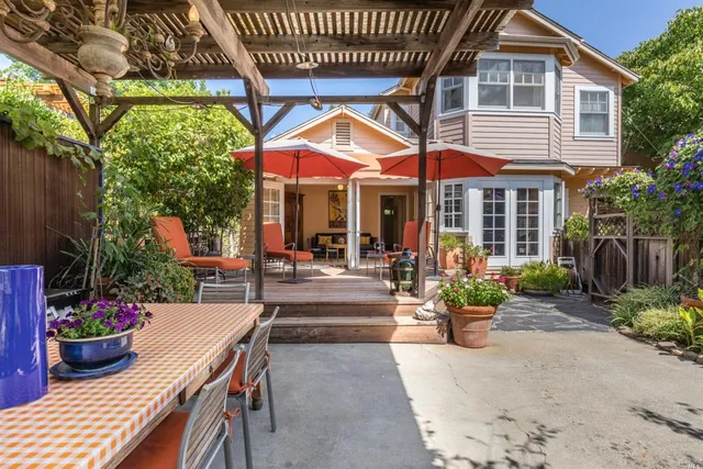 a view of a cafe with sitting area