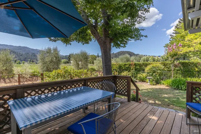 a view of a wooden bench with furniture