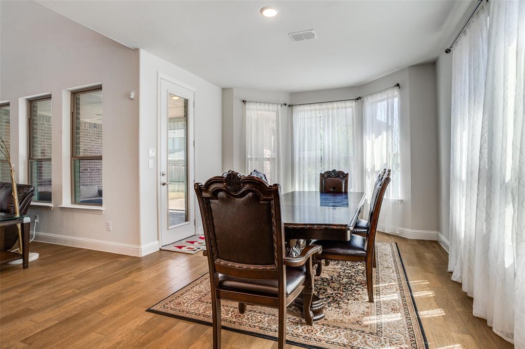 16380 Radstock Road Frisco, TX 75033 - Photo 9 of 39 Dining space featuring light wood-style floors and baseboards