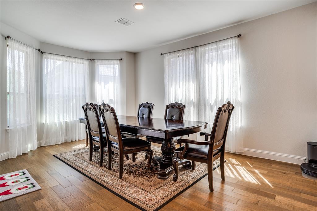 16380 Radstock Road Frisco, TX 75033 - Photo 10 of 39 Dining room featuring light wood-style flooring and plenty of natural light