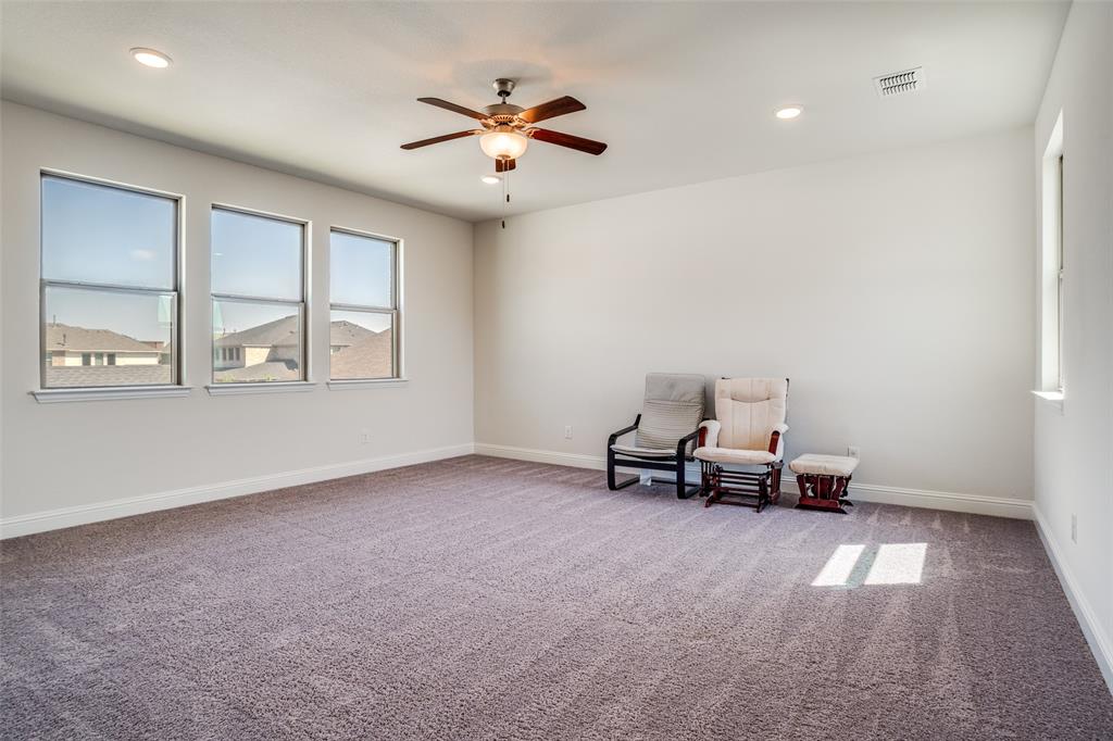 16380 Radstock Road Frisco, TX 75033 - Photo 16 of 39 Unfurnished room with a ceiling fan, light colored carpet, and recessed lighting